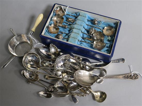 A set of six Chinese decorative sterling silver spoons (cased), a Victorian silver strainer with ivory handle, sundry silver spoons etc